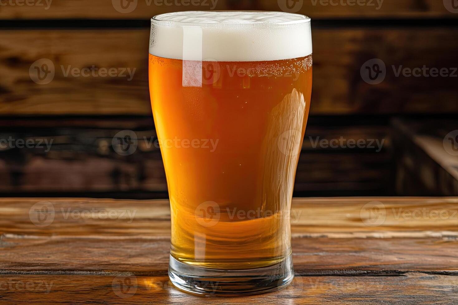 Light amber beer in a tall glass photo
