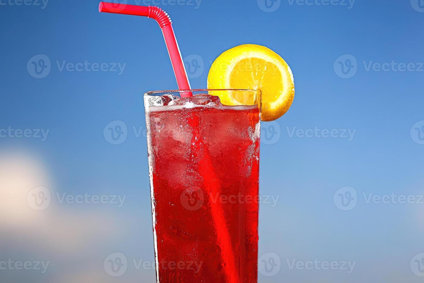 Refreshing red drink with lemon photo