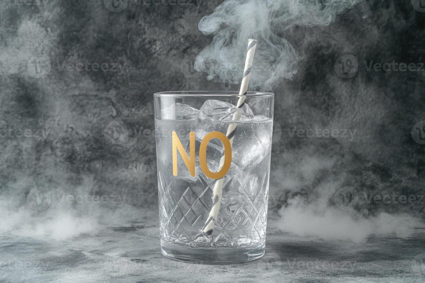 A glass of water with a straw in it with the word no written on it photo