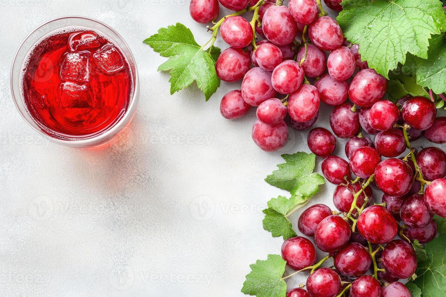 Fresh red grapes and juice photo