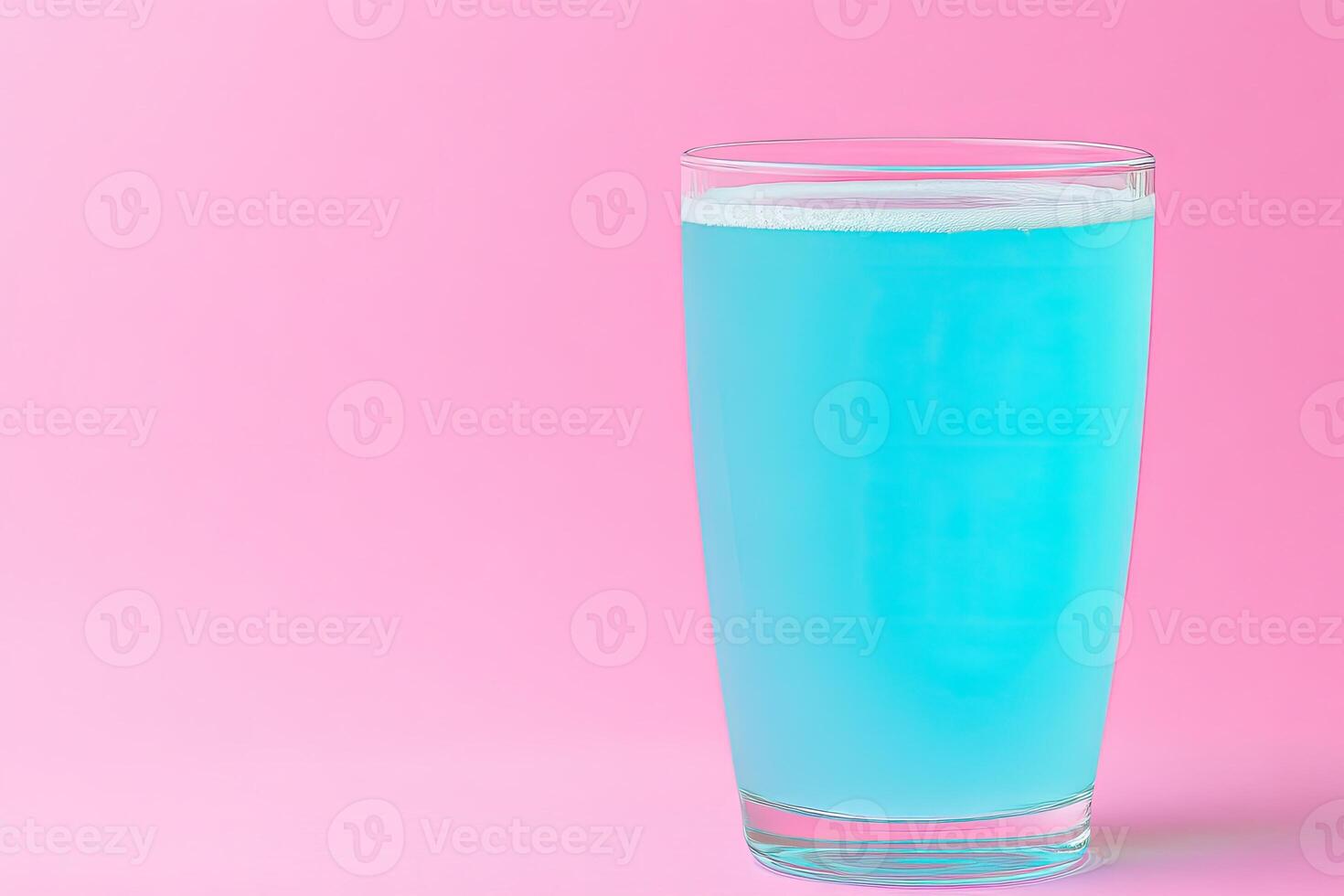 Cool, vibrant blue drink in a glass photo