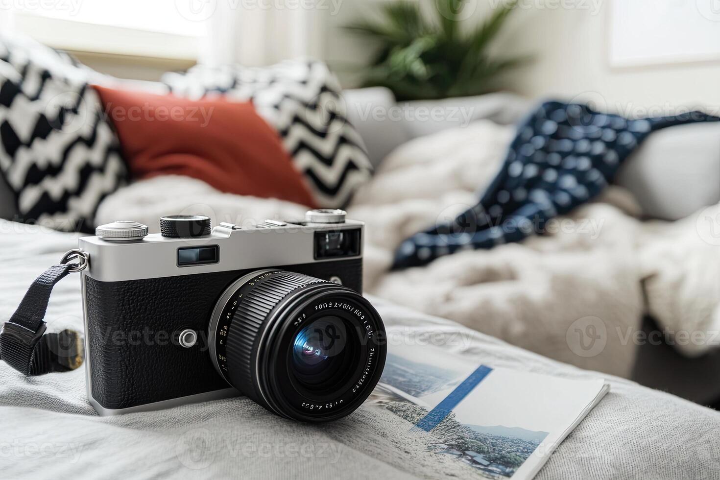 Vintage camera on a bed, cozy living room photo