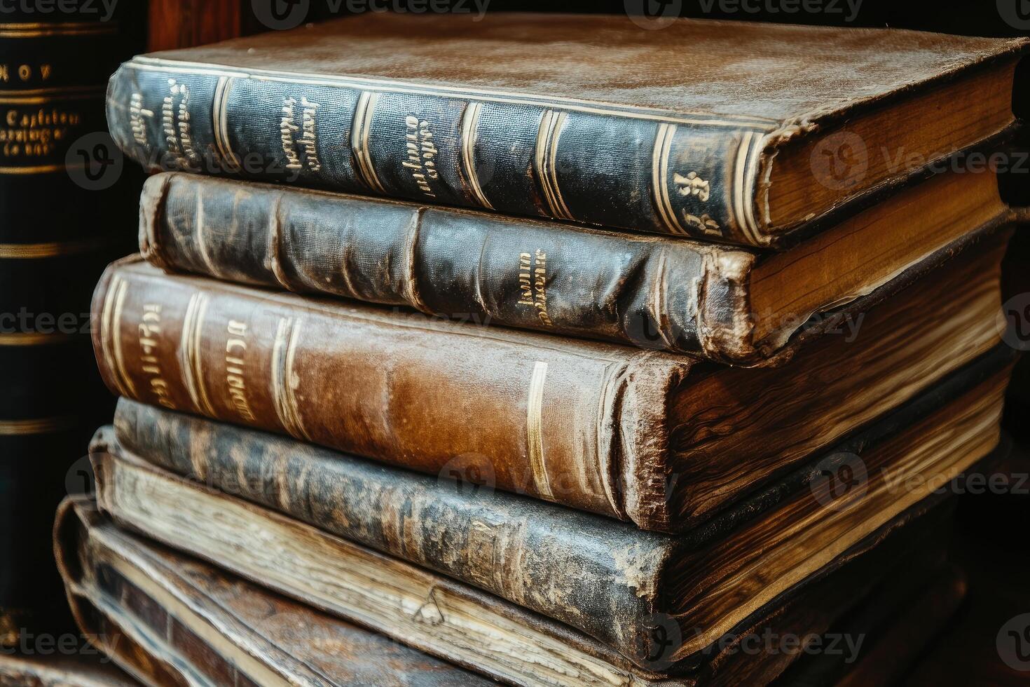 Stack of aged, leather-bound books photo