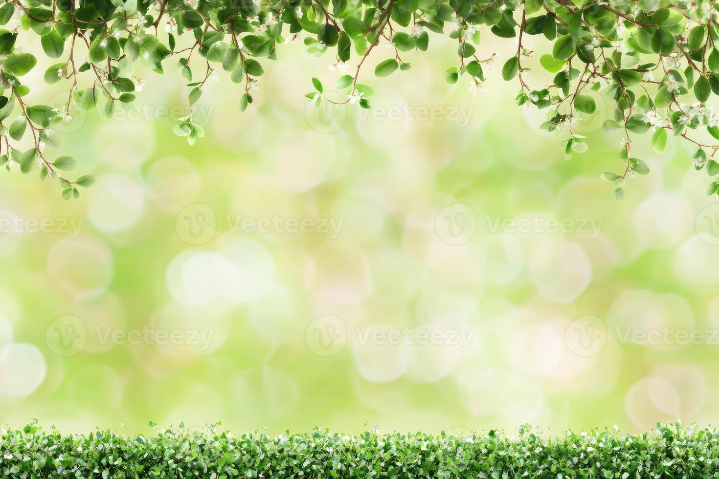 Fresh spring foliage border. Green leaves and plants frame a soft, blurred background of out-of-focus greenery. A delicate arrangement of plants creates a natural, serene ambiance photo