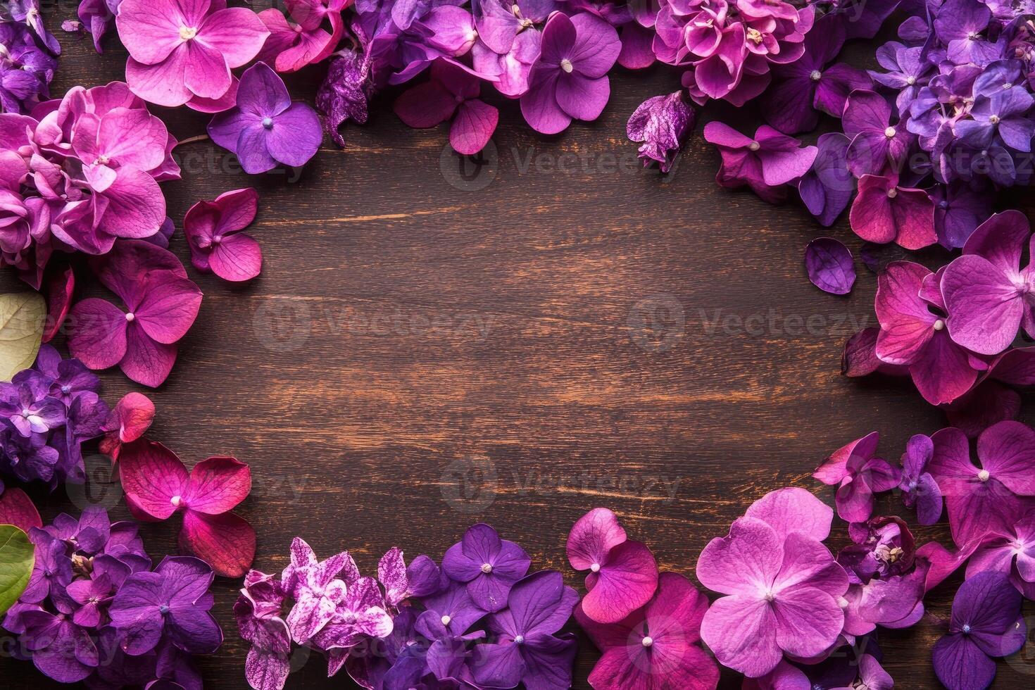 Floral Frame on Wooden Background photo