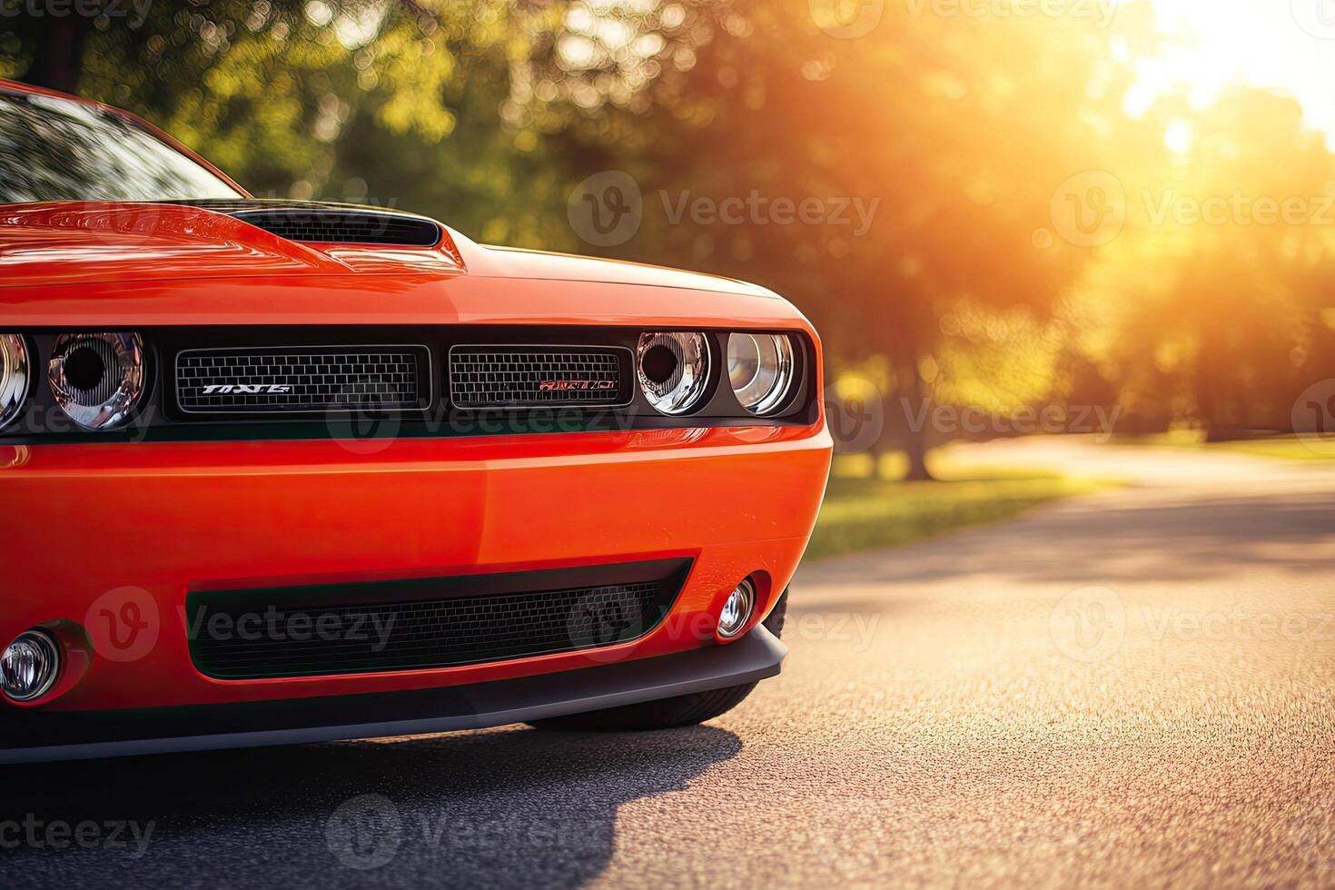 Orange muscle car in sunlight photo