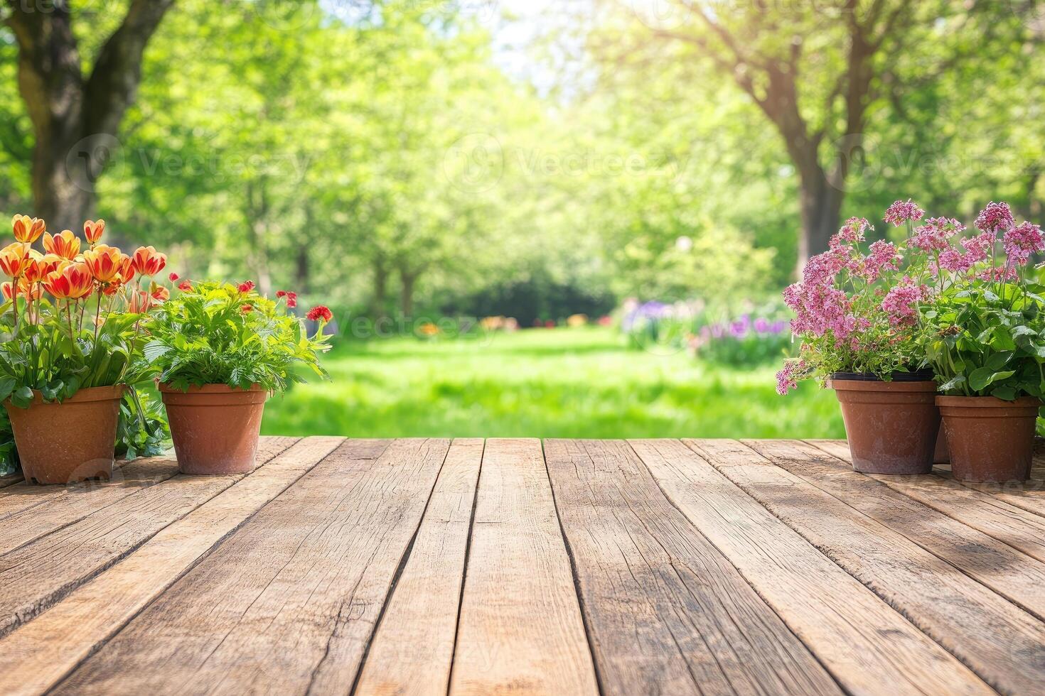 Wooden deck with colorful flowers in garden setting photo