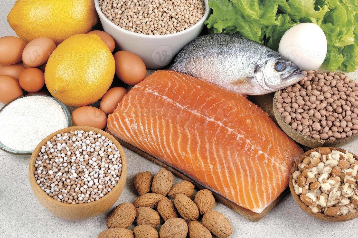 Fish, nuts, eggs, almonds, and other foods photo