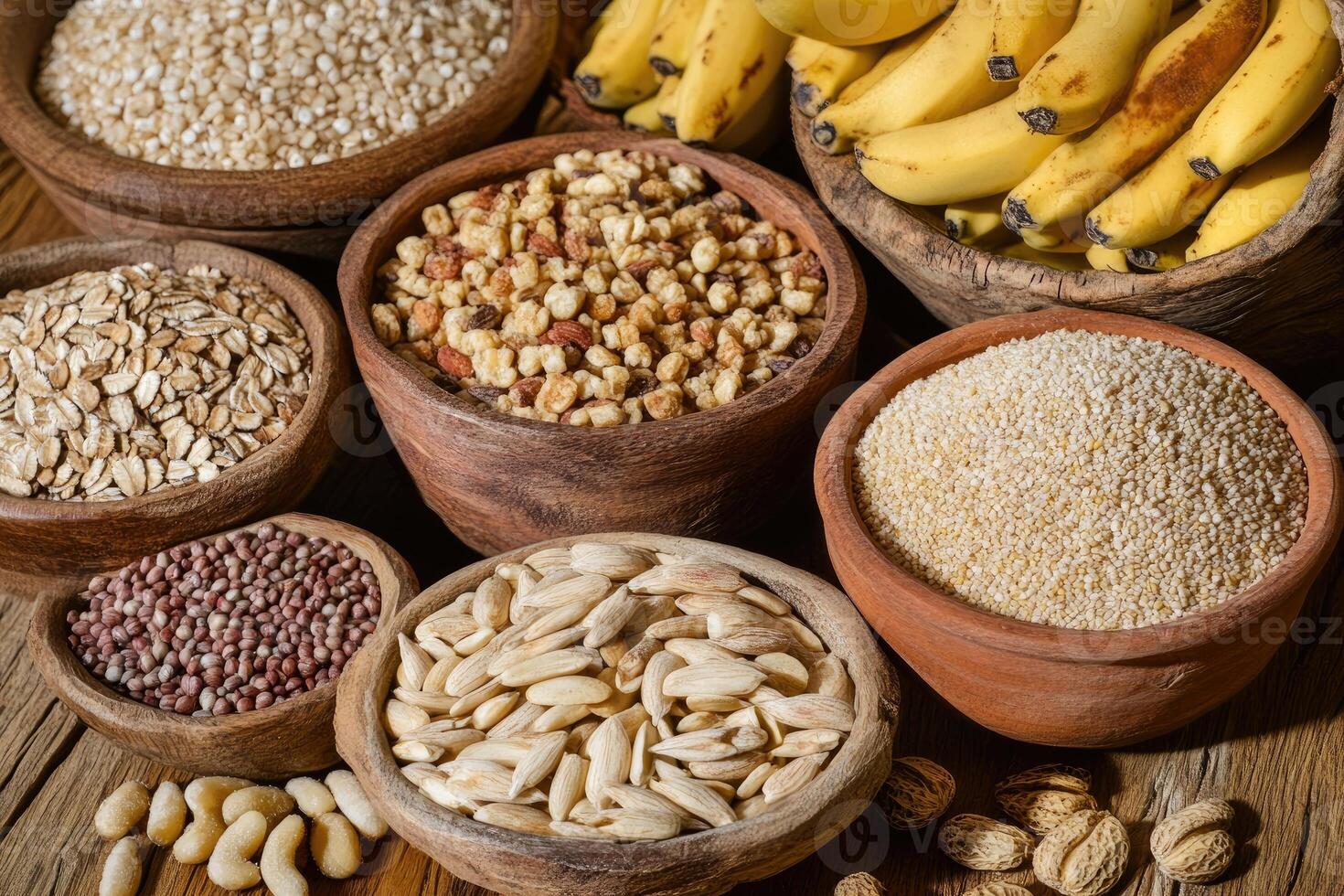 Assorted grains, nuts, and seeds in rustic bowls photo