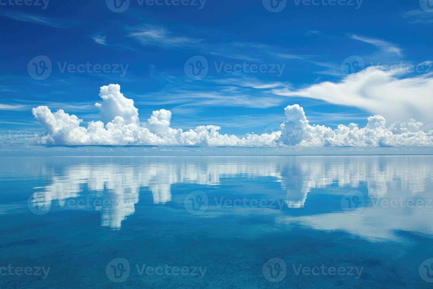 Calm Azure Waters Reflecting Clouds photo