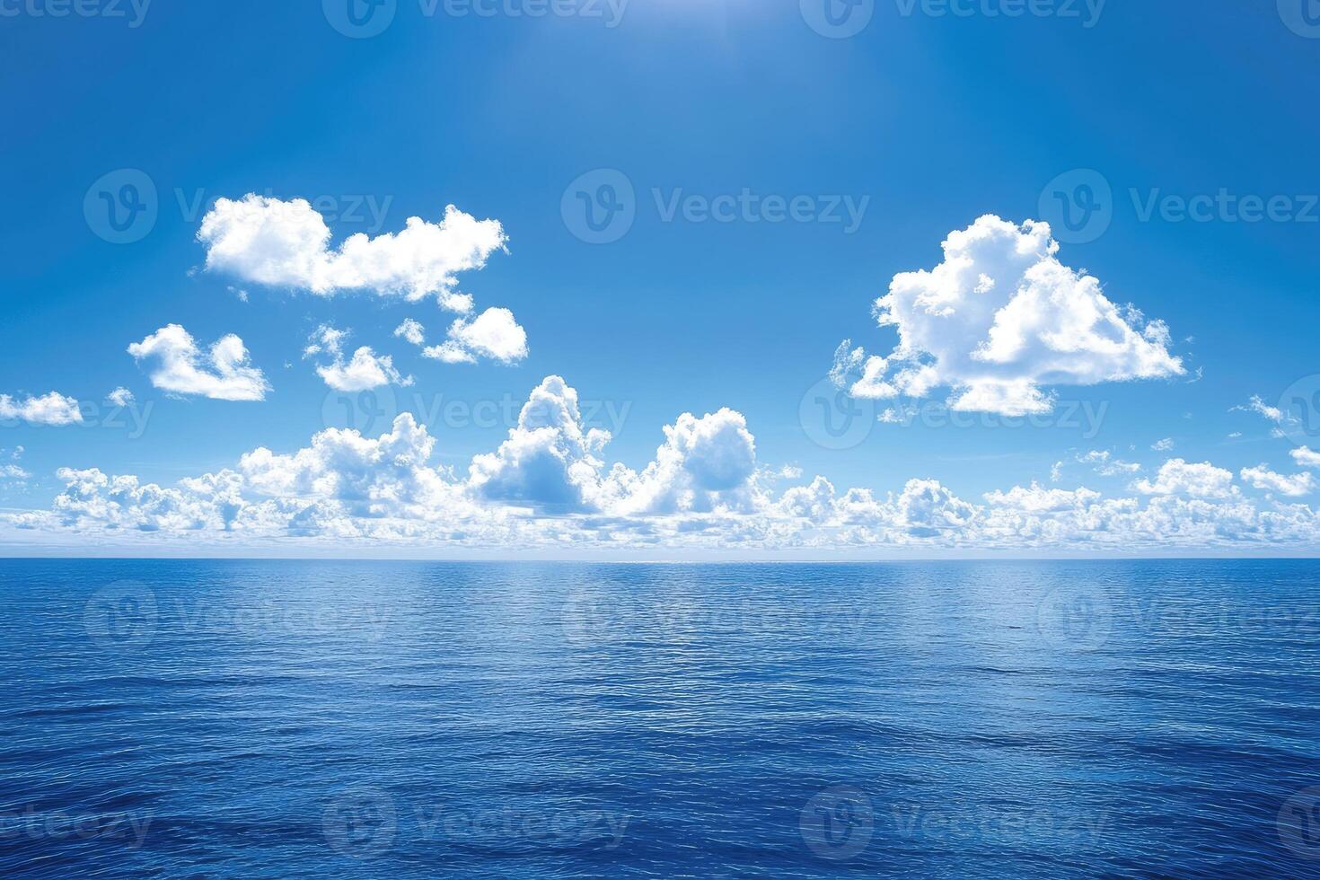 Vast ocean meets a clear sky photo