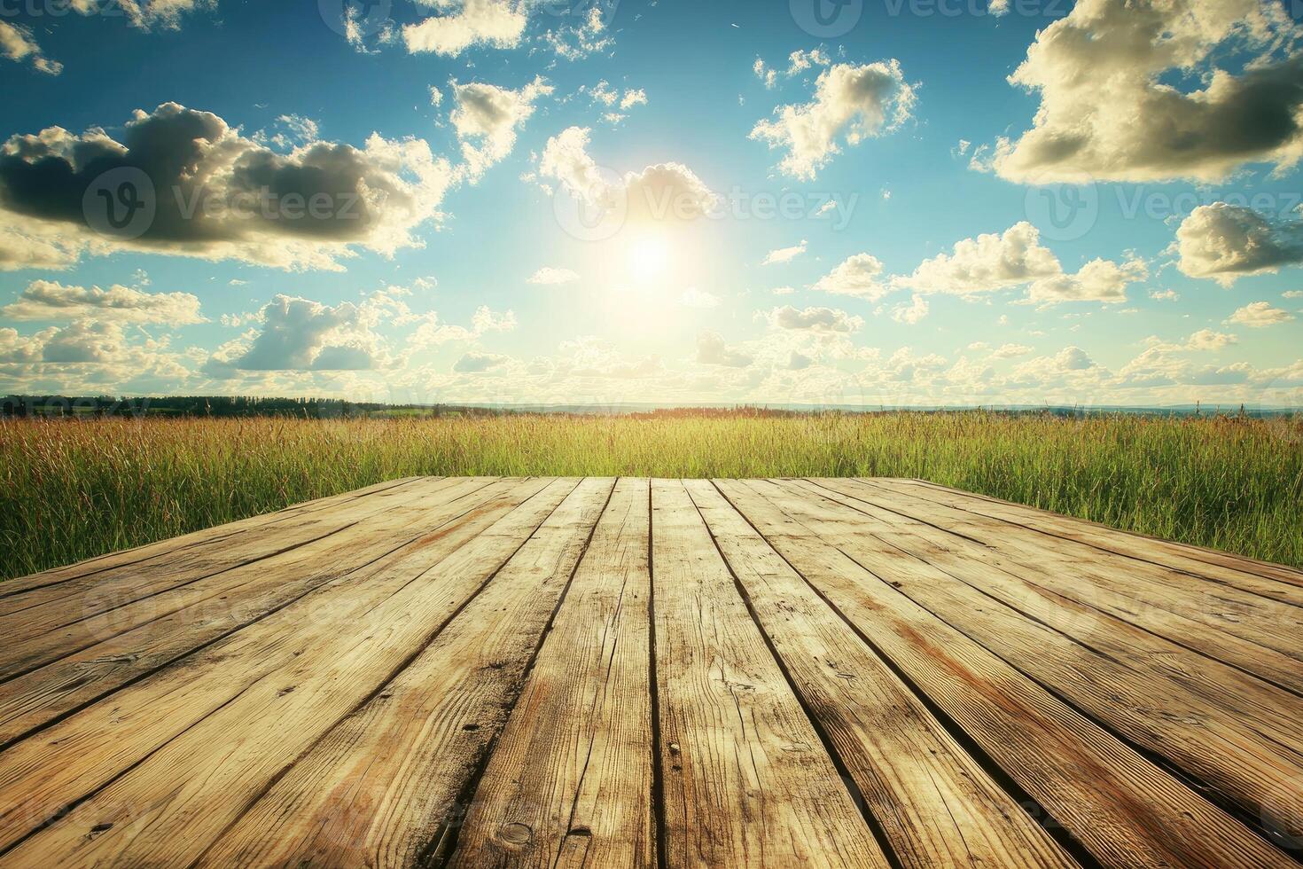 Rustic wooden deck overlooking a summer field photo