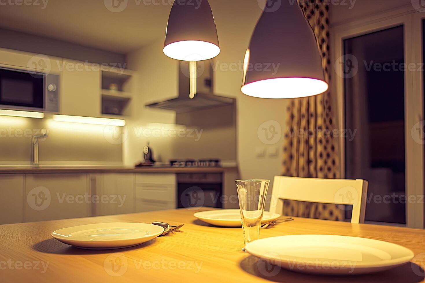 Cozy kitchen dining area at night photo