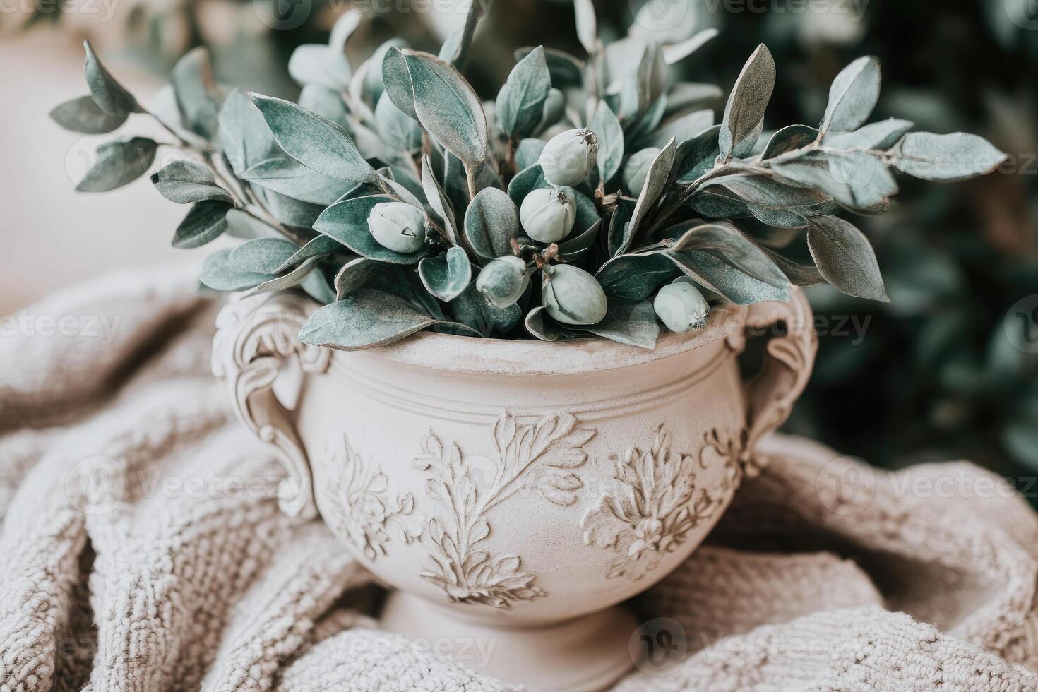 Elegant, muted pastel tones, decorative bowl with greenery and berries photo