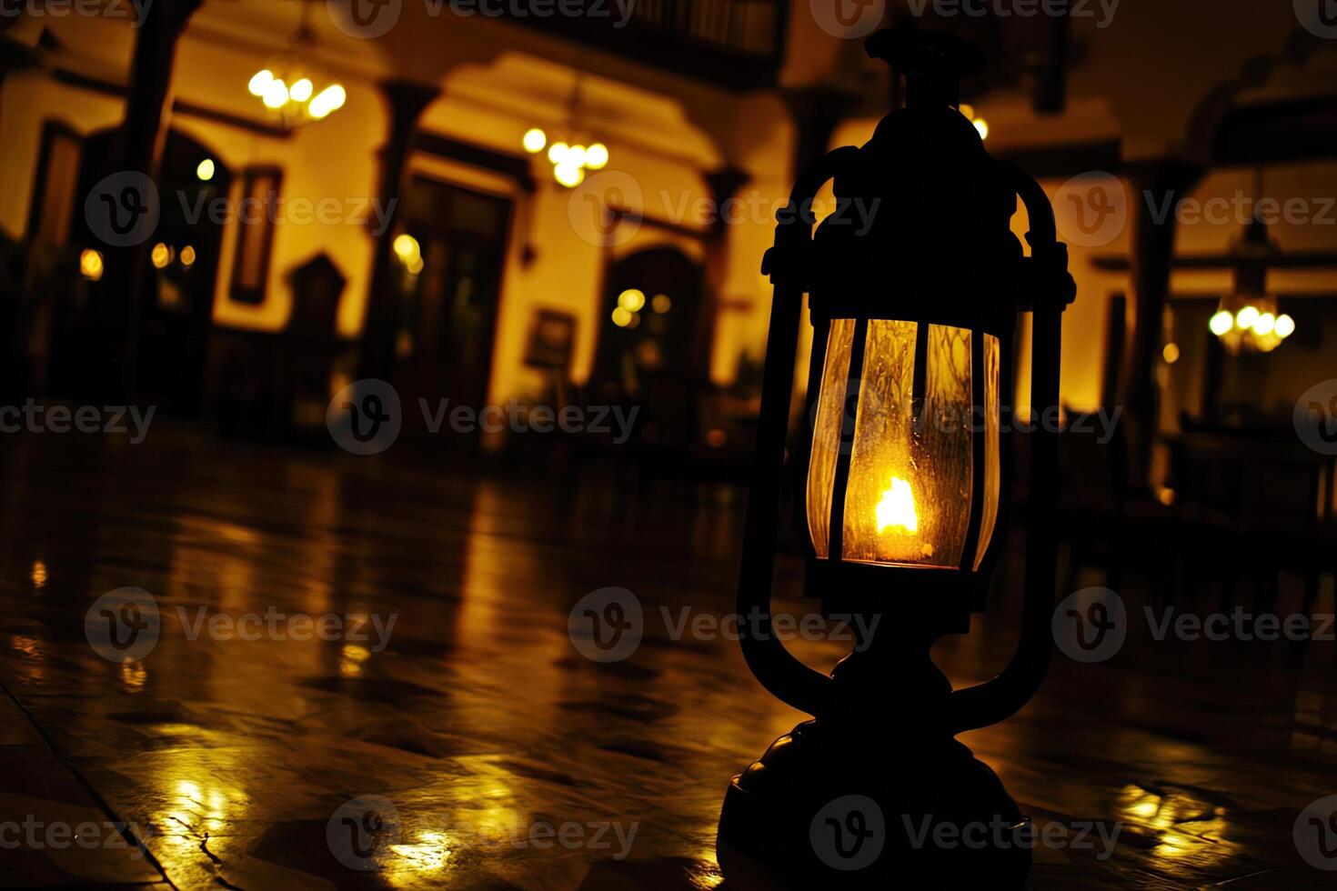 Luminous antique lantern in a grand hall at night photo