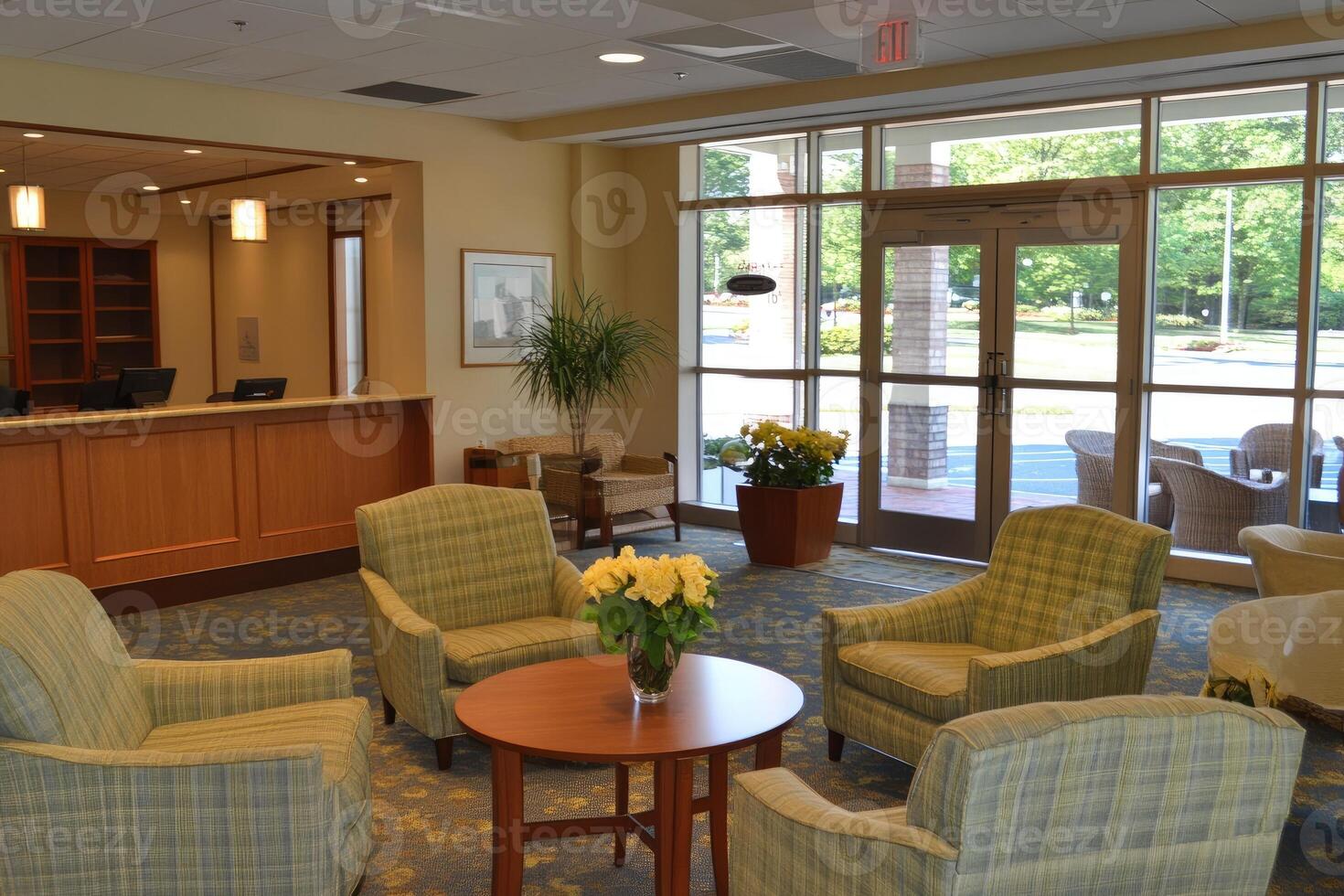 Bright, inviting lobby with comfortable seating and outdoor views photo