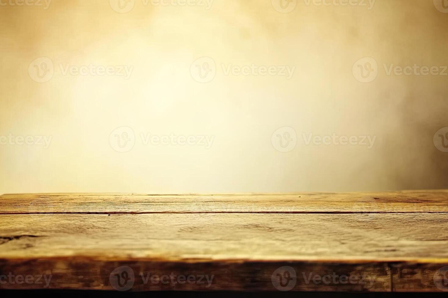Rustic wooden table top against a warm, hazy backdrop photo