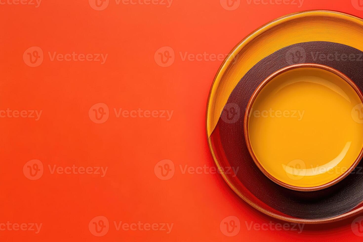 Colorful ceramic plates on red background photo