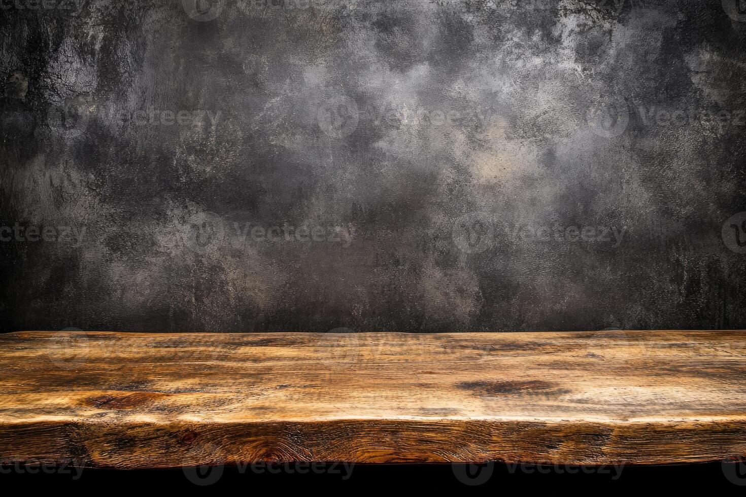 Rustic wooden table against a textured dark gray wall photo