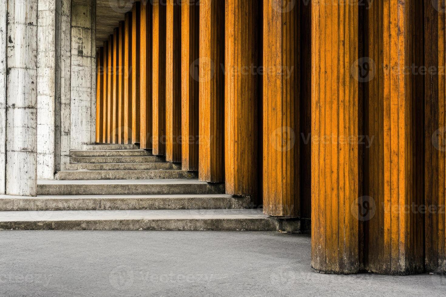 Perspective of orange columns and concrete steps photo