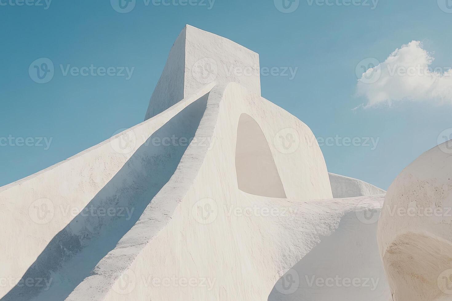 White architectural structure against a clear sky photo
