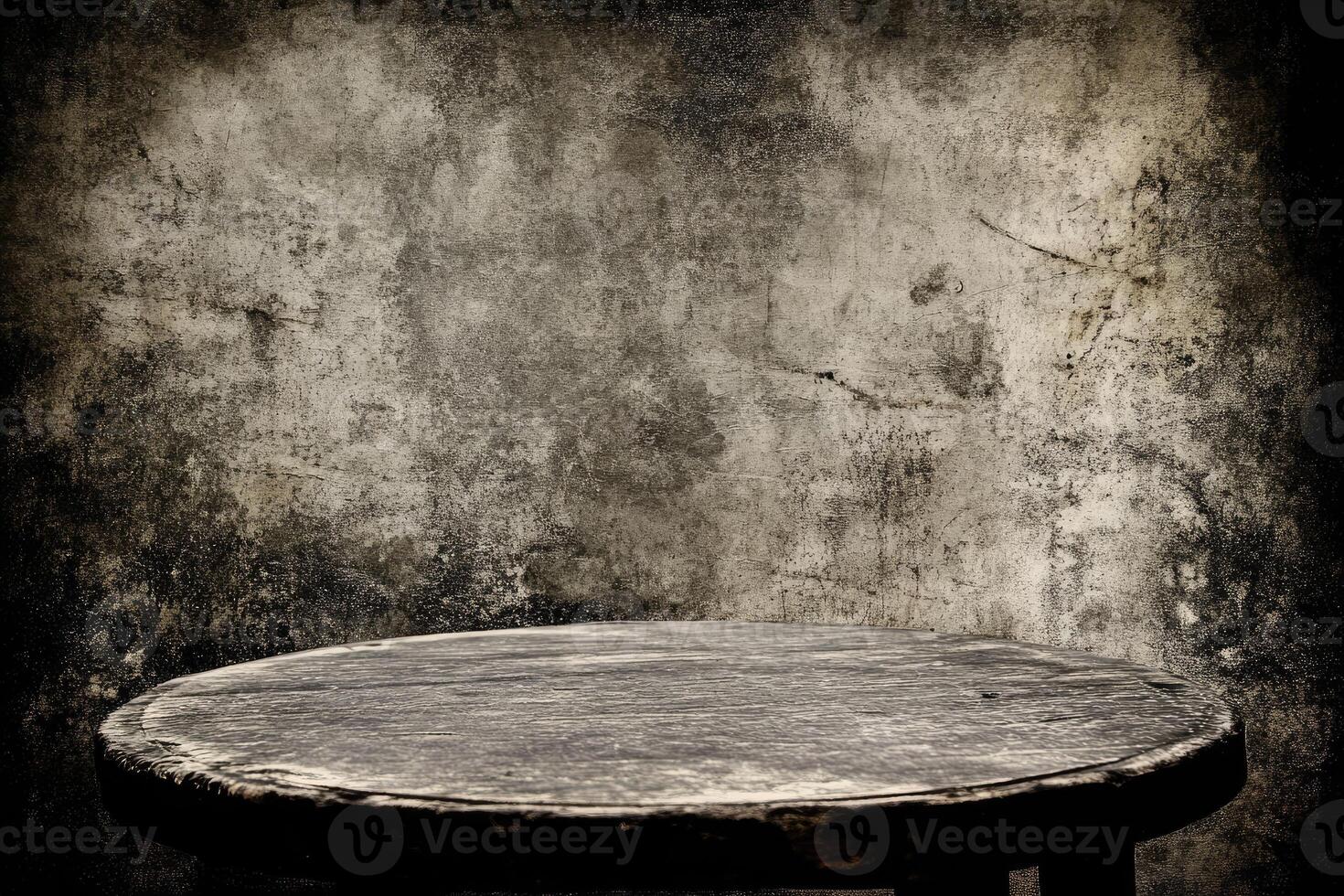 Aged wooden table against a textured wall photo