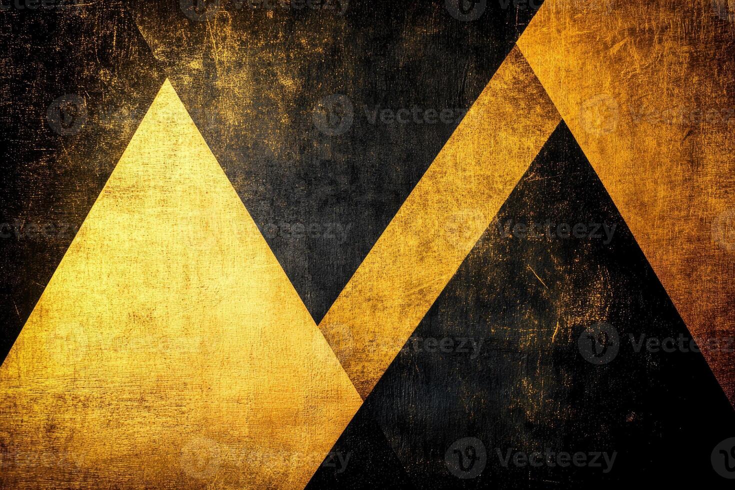 Geometric, textured pattern of gold and dark triangles photo