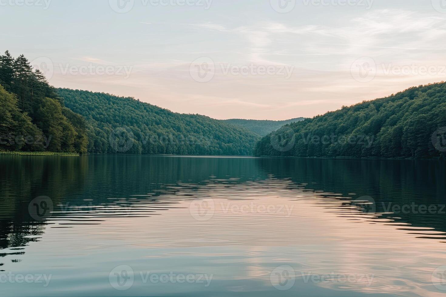 Serene lake nestled in a valley photo