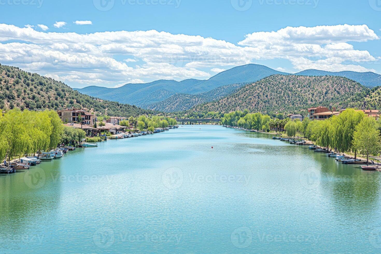 Serene river flows through a picturesque valley photo