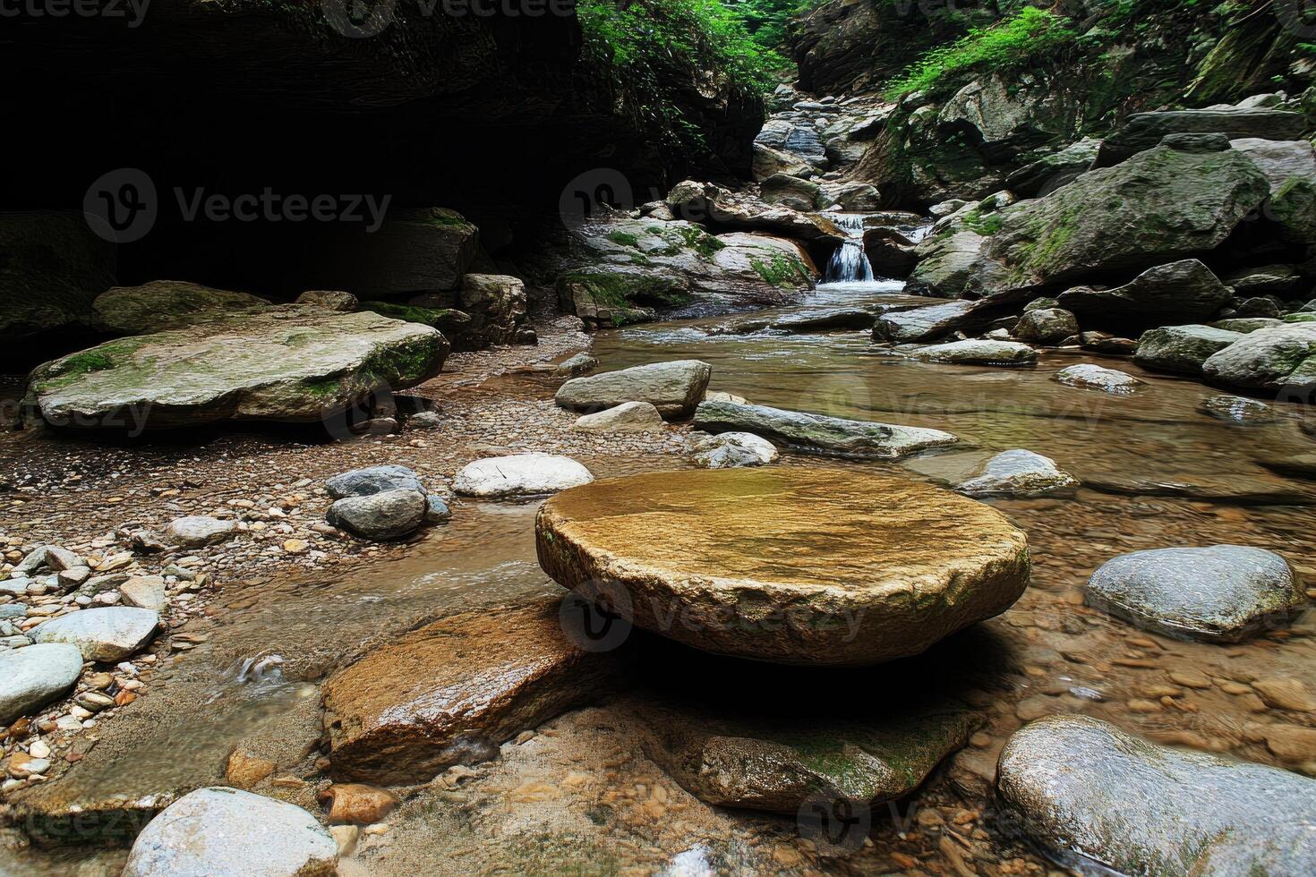 Tranquil mountain stream with smooth rock photo
