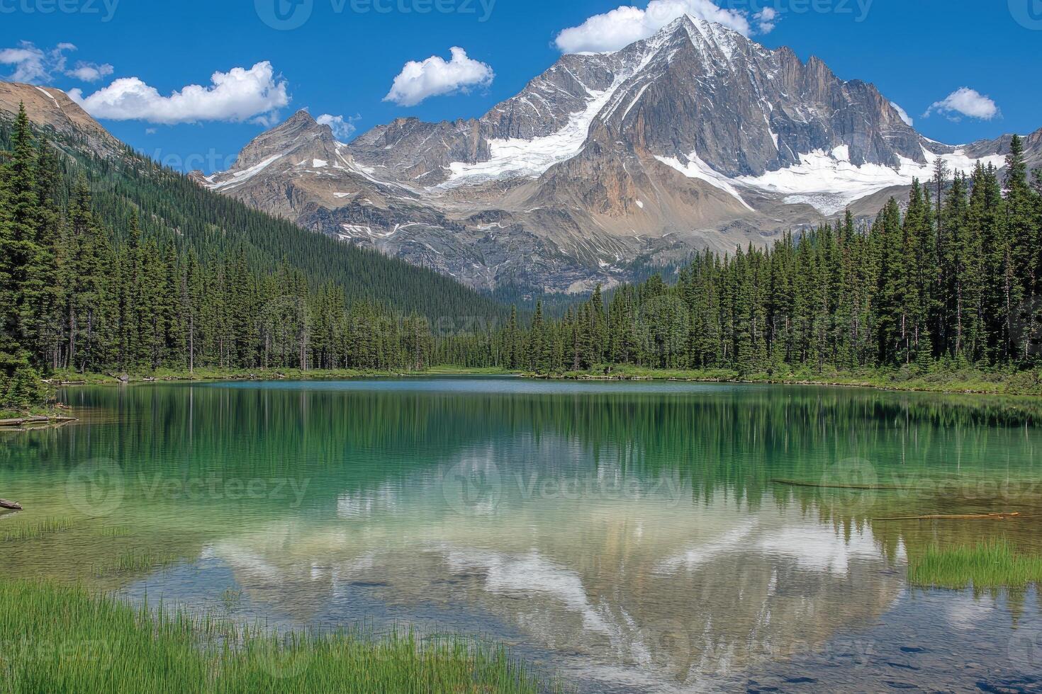 Serene mountain lake nestled in a valley photo