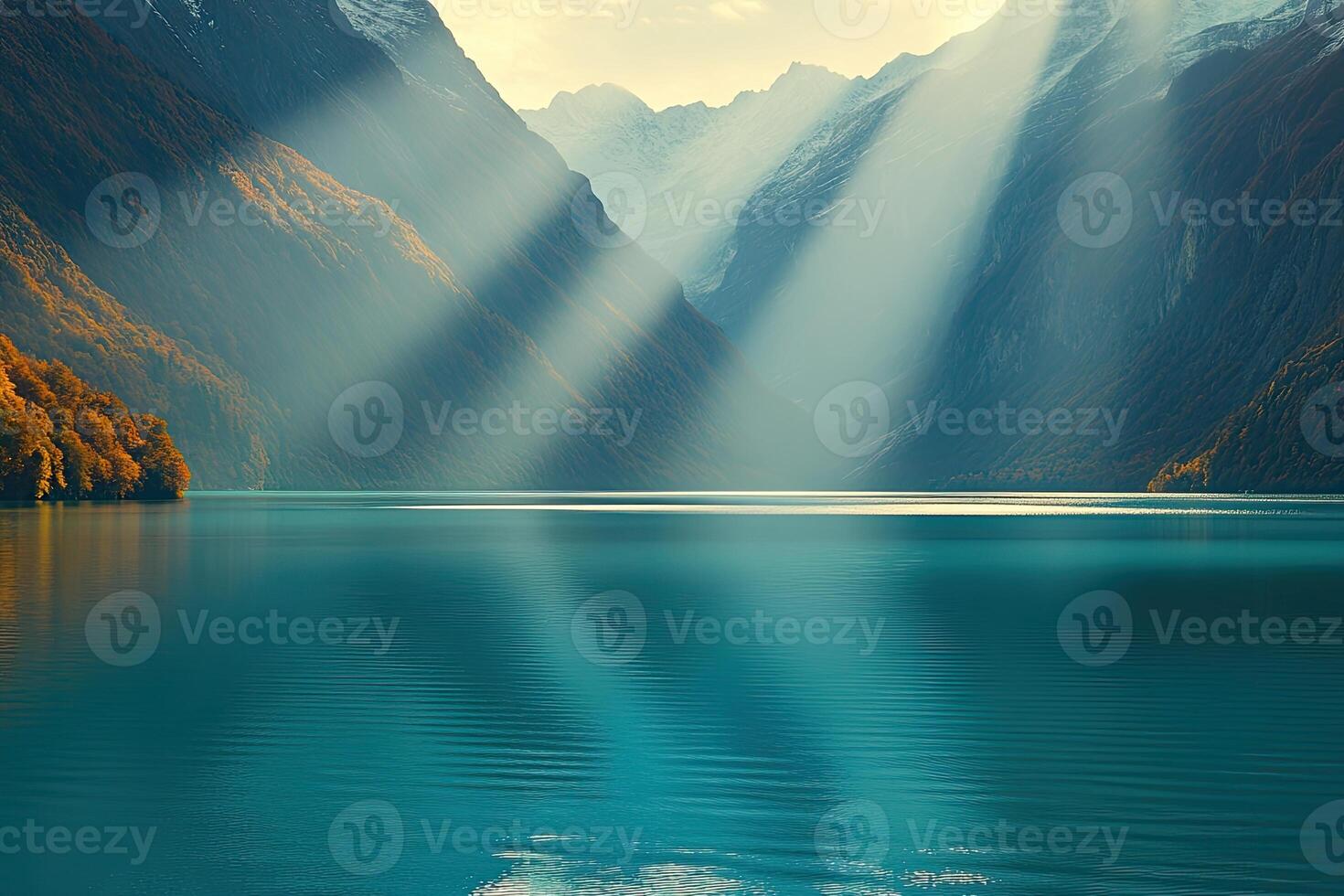 Serene mountain lake bathed in sunlight photo