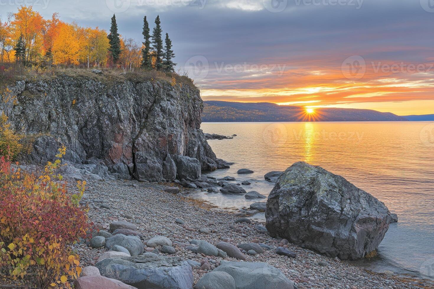 Autumnal Lakeside Cliff at Sunrise photo