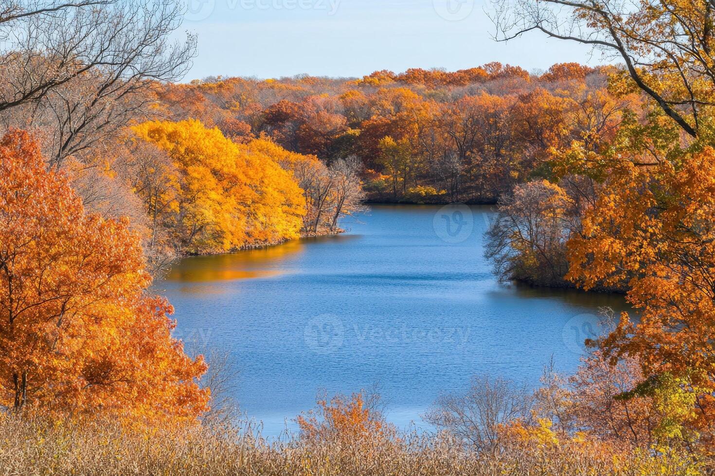 Autumnal lake scene with vibrant fall foliage photo