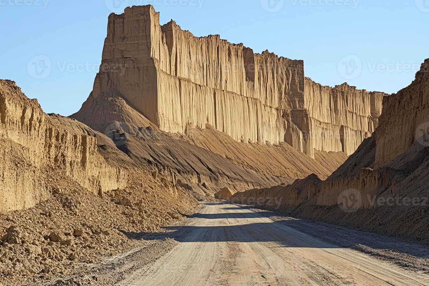 Desert Road Through Dramatic Cliffs photo