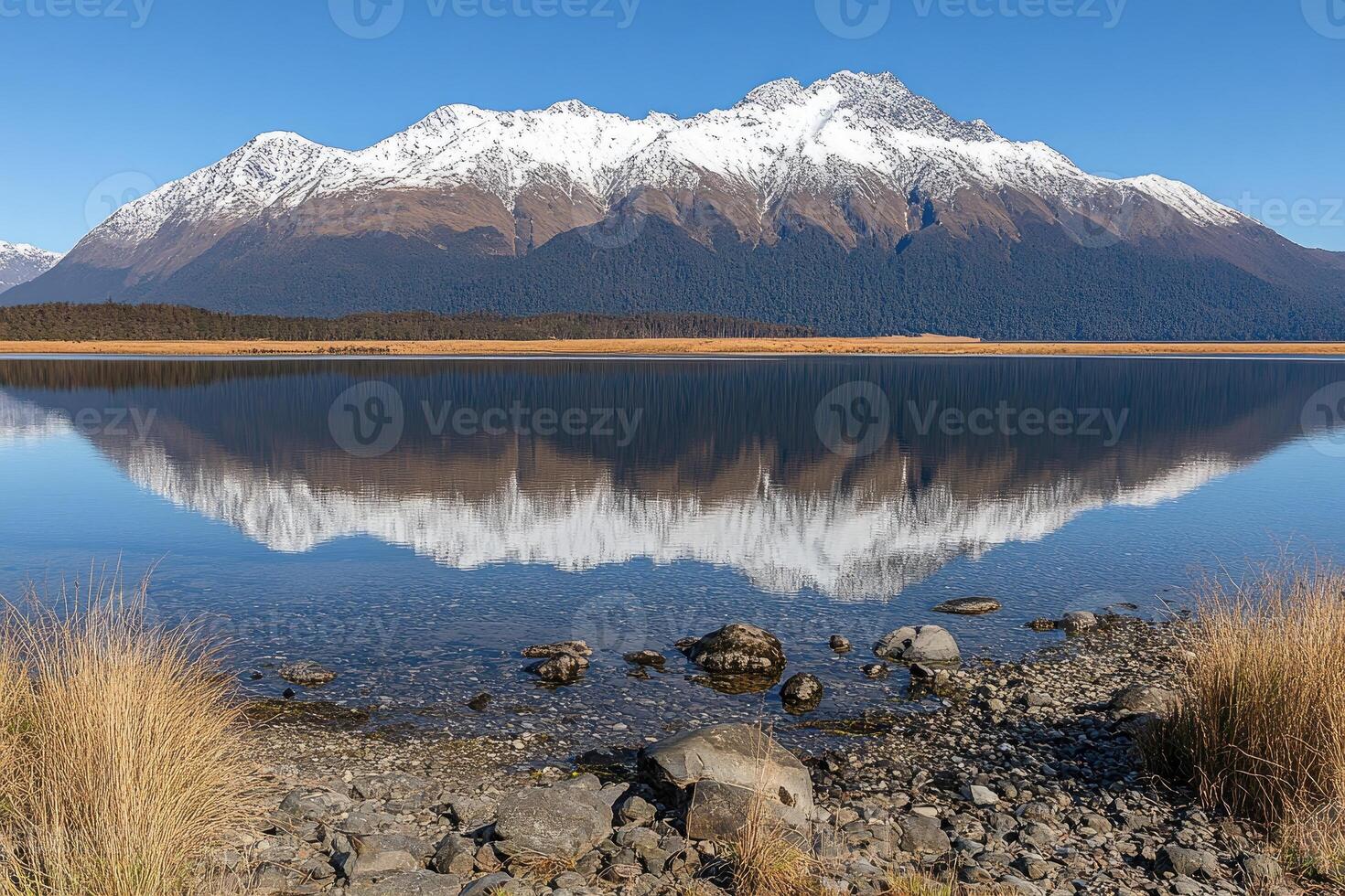 Mountain reflection on a serene lake photo