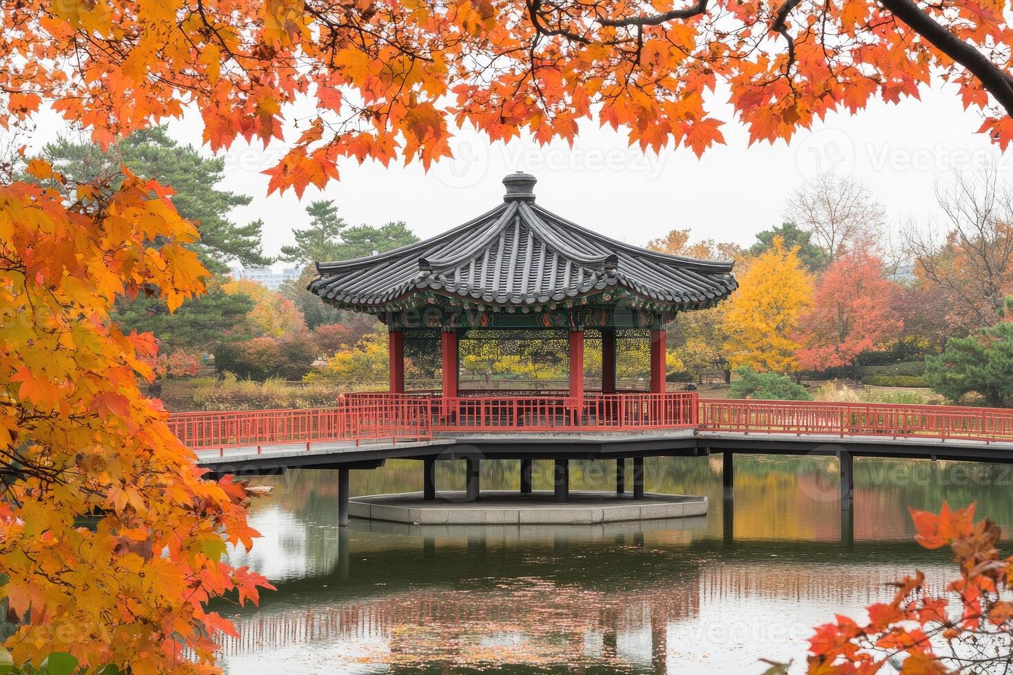 Autumnal Japanese-style Pavilion over a pond photo