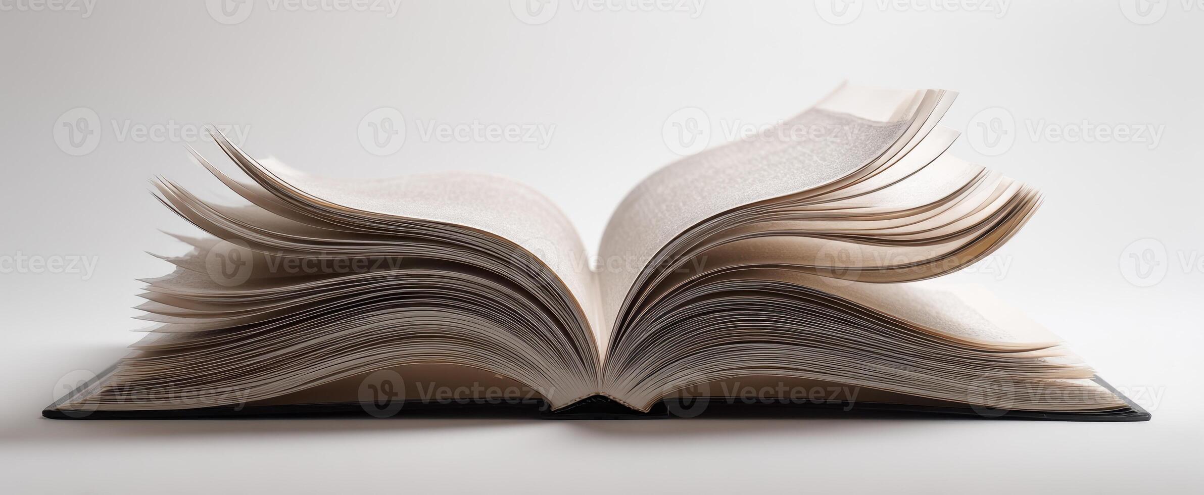 The open book showcasing its beautiful, well-loved pages on a minimalist background photo