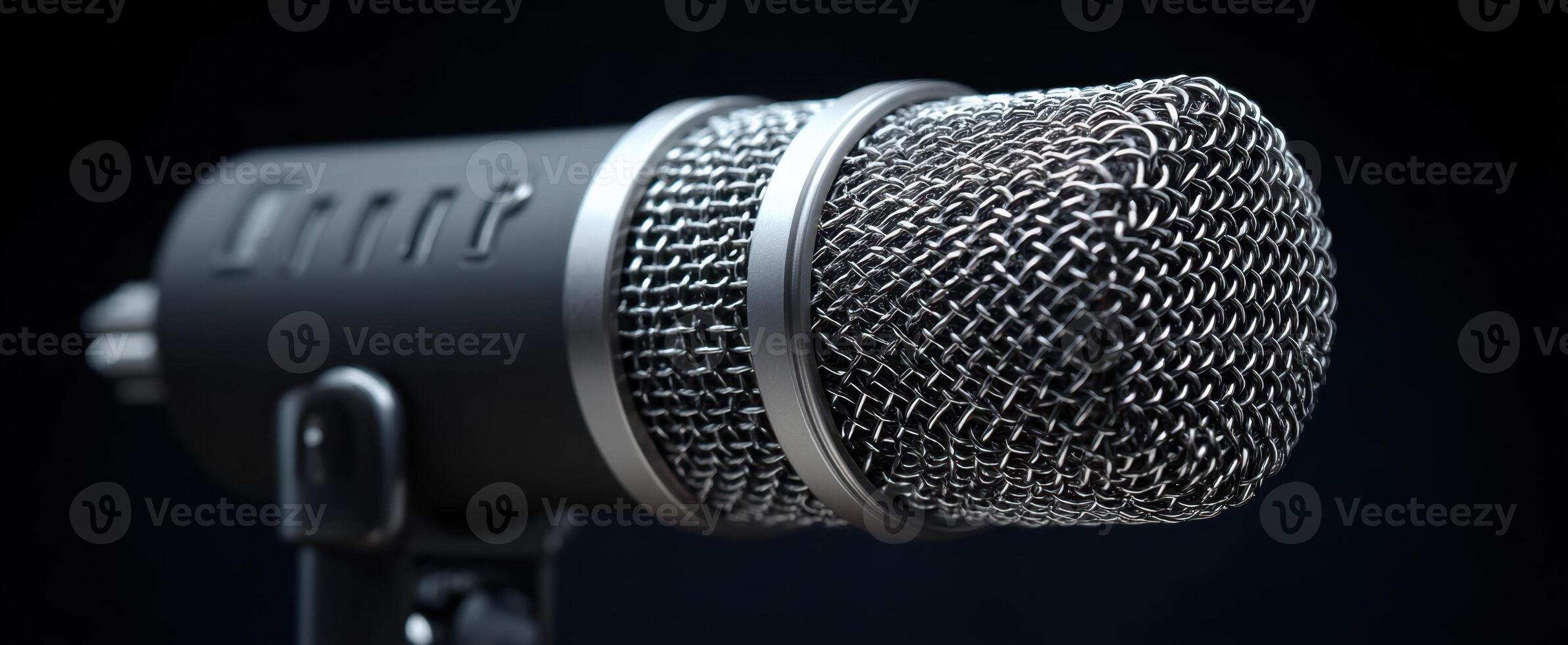 The detailed close-up of a professional microphone showcasing intricate design elements. photo