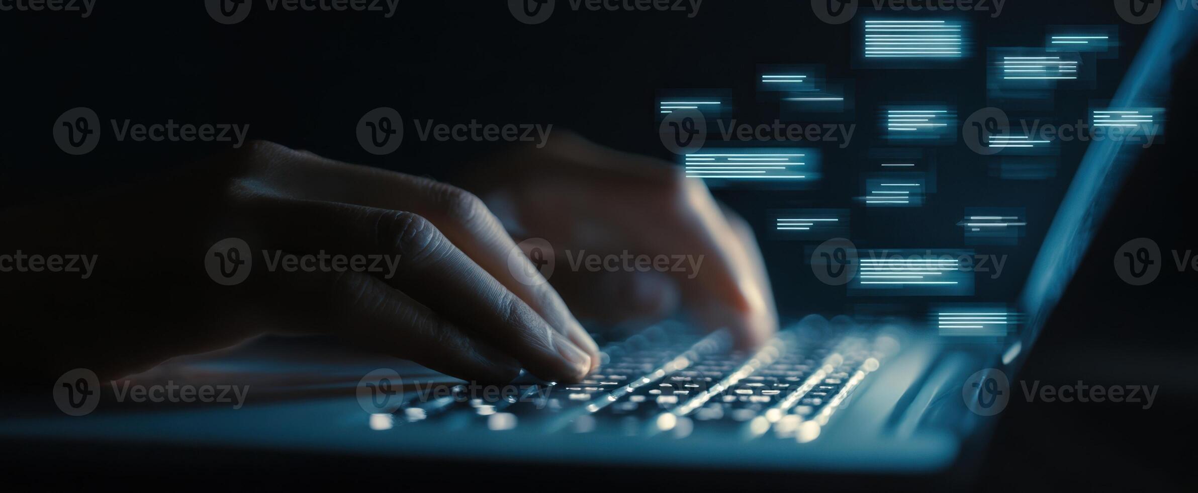 The laptop with hands typing and streaming digital information in a dark setting. photo