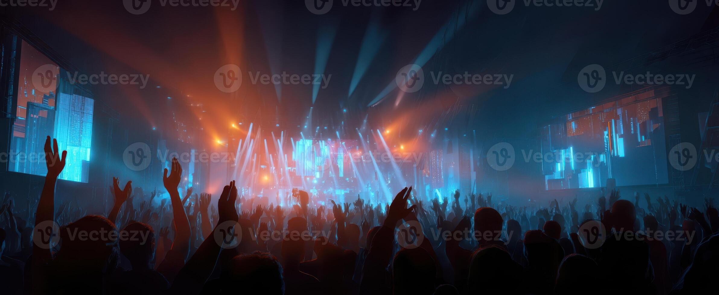The electrifying concert experience with vibrant lights and an enthusiastic crowd. photo