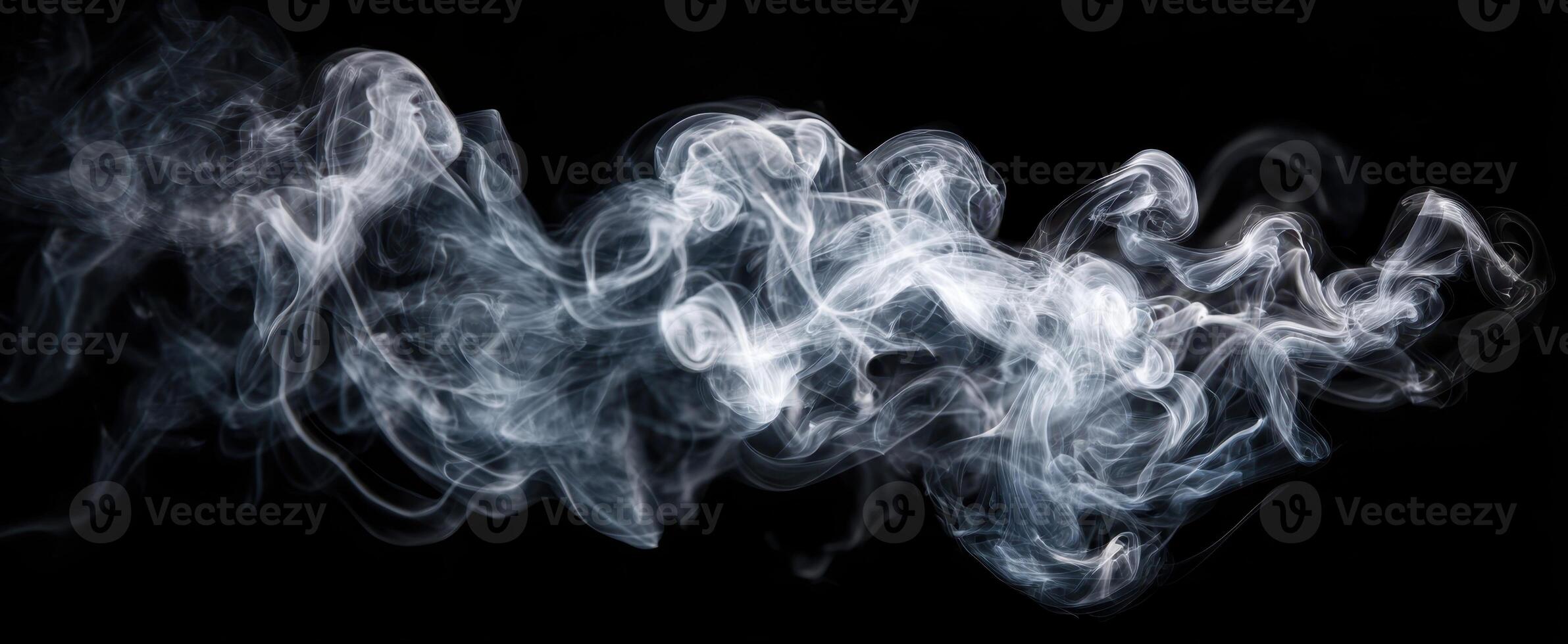 The ethereal dance of smoke swirls against a dark backdrop. photo