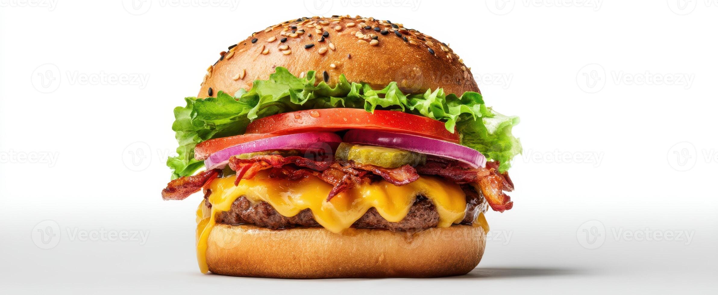 The mouthwatering cheeseburger with crispy bacon and fresh vegetables. photo