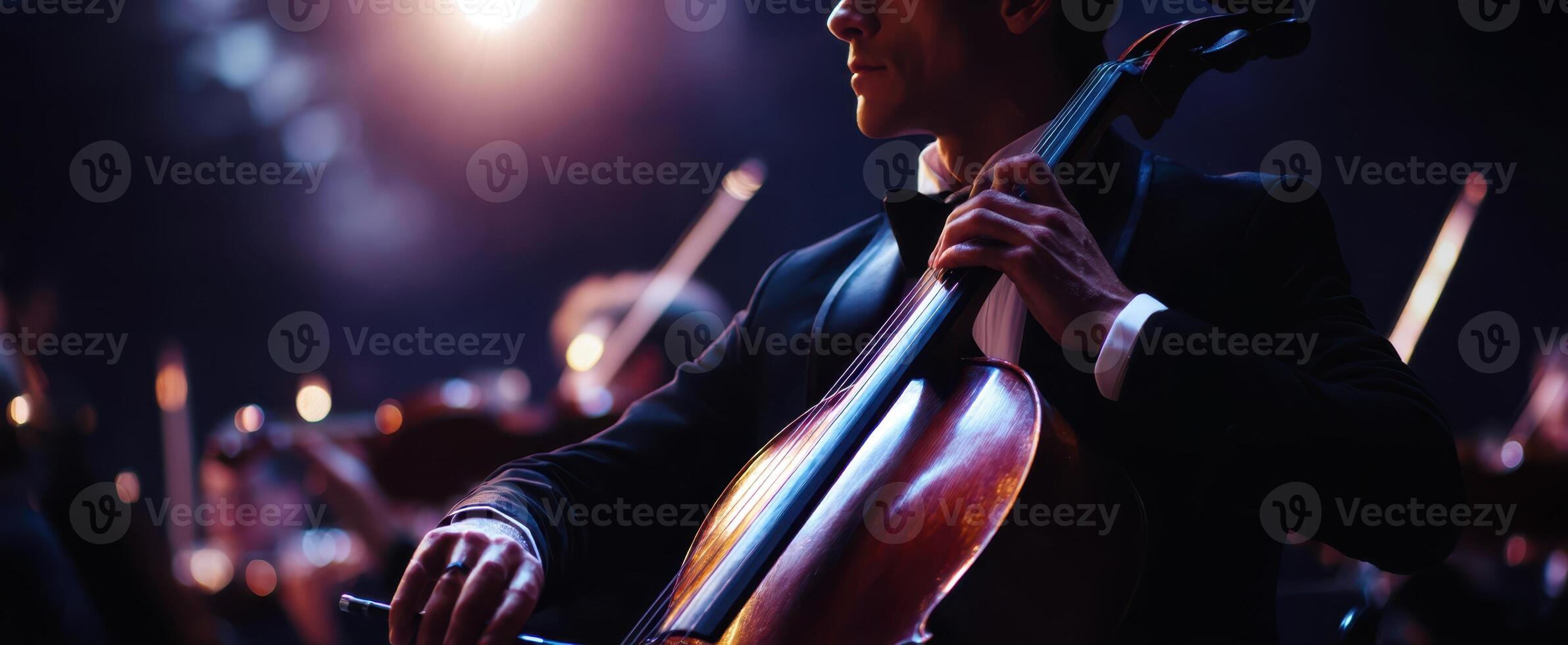 The Emotion of the Musician Playing Cello in a Stunning Orchestra Performance photo