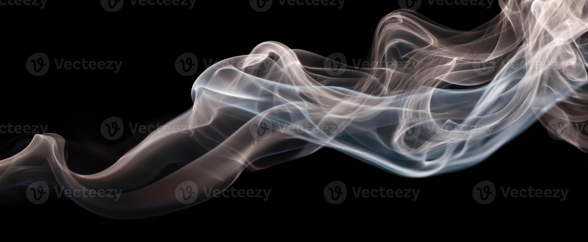 The Elegant Dance of Smoke Against a Black Background photo