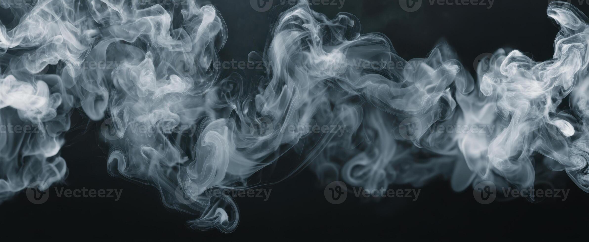The flowing smoke pattern against a dark background creates an ethereal atmosphere. photo