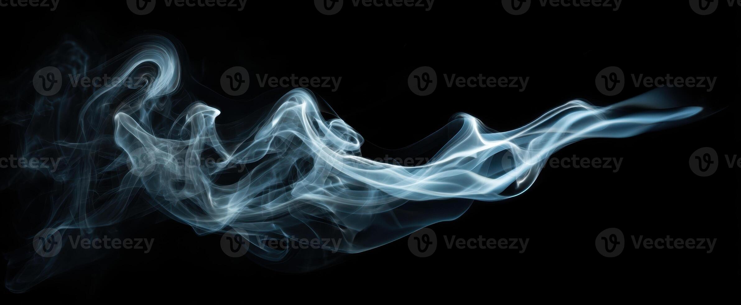 The Elegant Flow of Smoke Against a Dark Background photo