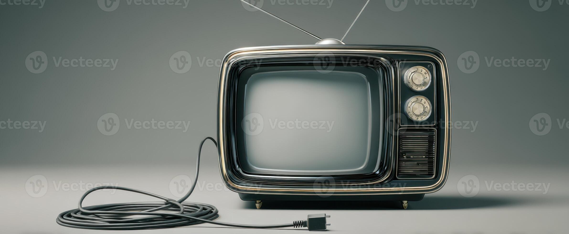 The vintage television set with an unplugged cord against a minimalist background. photo