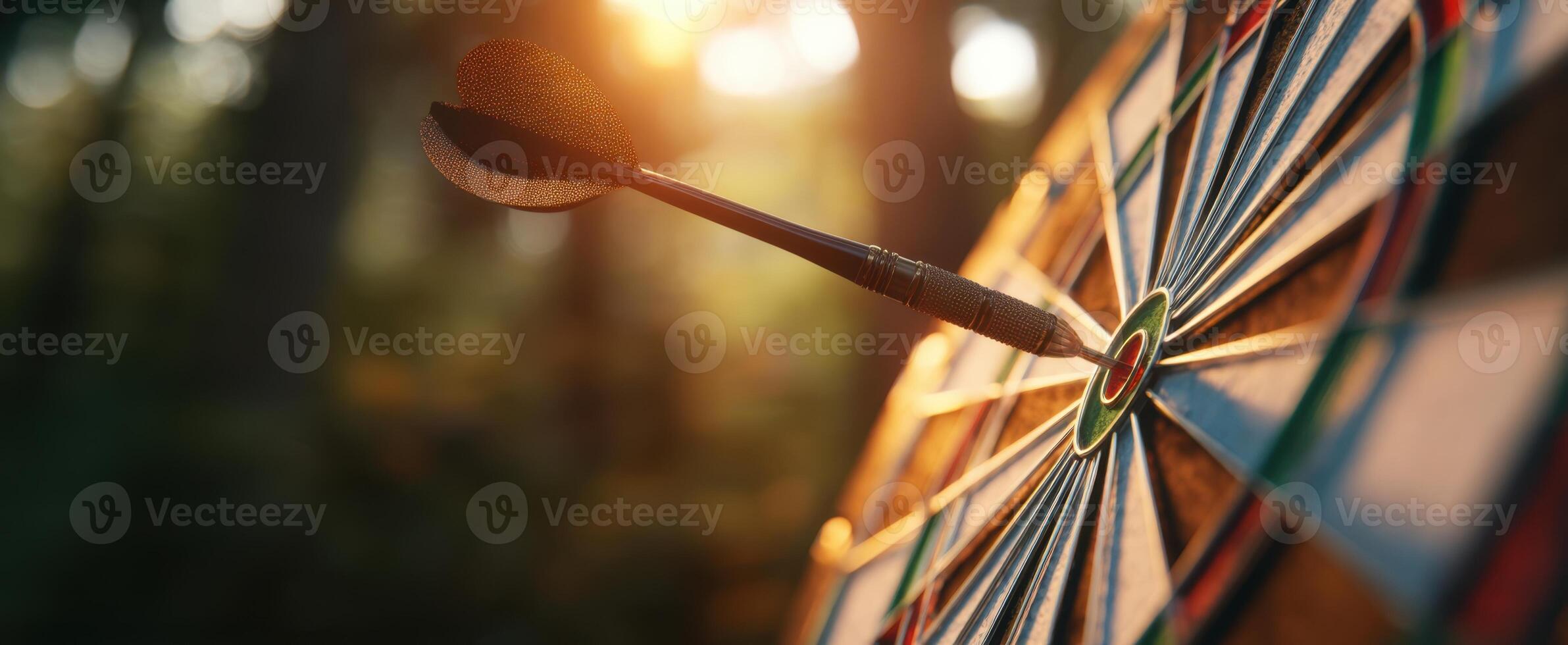 The dart striking the bullseye on a vibrant outdoor dartboard. photo