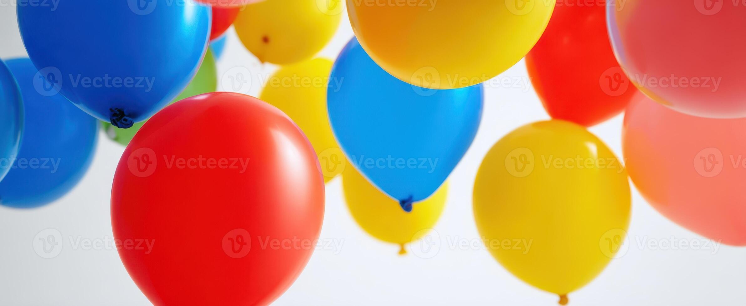 The colorful balloons floating cheerfully in a bright festive atmosphere photo